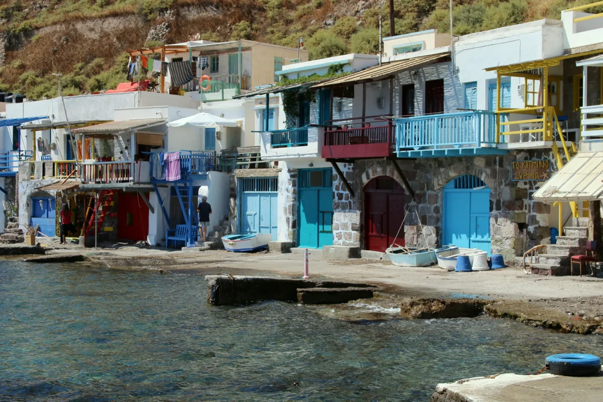 Klima fishing village in Milos with painted boat garages at the waterline